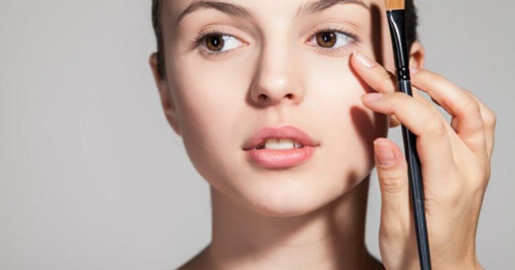 Applying Concealer to Cover the Bruise